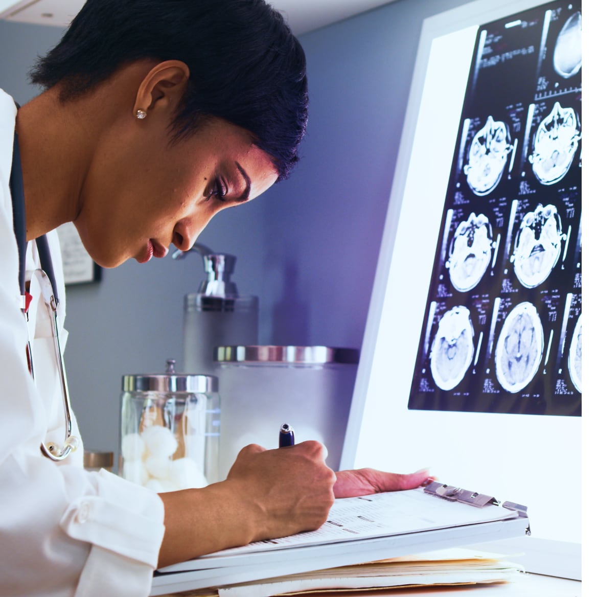 A doctor reviewing xrays